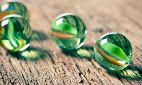 Image of 4 green marbles